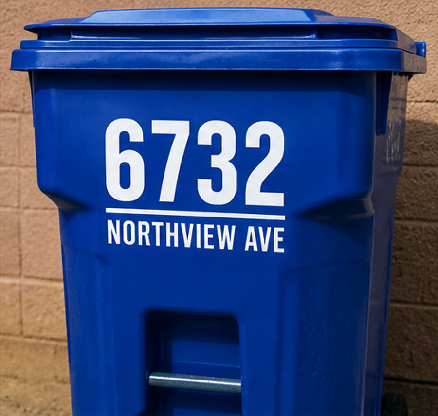 White 6732 Northview Avenue decal on a blue bin